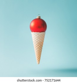 Christmas Decoration Bauble In Ice Cream Cone. New Year Minimal Concept.