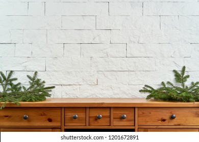 Christmas Decoration With Blank Space With Twigs Of Spruce On An Old Shelf On The Background Of A White Brick Wall