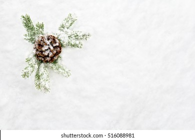 Christmas Decoration. Branch Christmas Tree And Cone Pine On Snow. Top View, Flat Lay