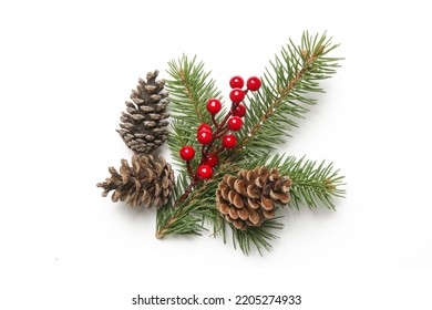 Christmas decoration element isolated on white. DIY festive, natural, zero waste, plastic free winter holidays decor made of fir branches, pine cones and red berries.	 - Powered by Shutterstock