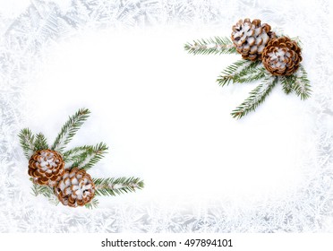 Christmas Decoration. Frame Of Cones Pine And Branch Christmas Tree On Snow On Background Of Frosty Pattern Of Winter Window With Space For Text. Flat Lay