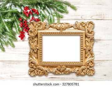 Christmas Decoration With Golden Picture Frame On Wooden Background. Winter Holidays