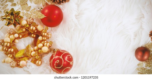 Christmas Decoration Lying On White Fur Carpet