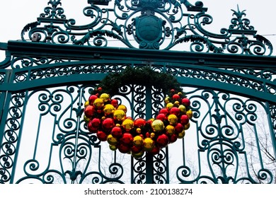 Christmas Decoration On Vintage Gates Of 19th Century