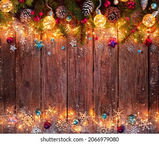 Christmas - Decoration On Wooden Illuminated With Lights With Fir Branches And Ornaments - Powered by Shutterstock