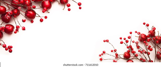 Christmas Decoration With Red Apples And Berries Isolated On White