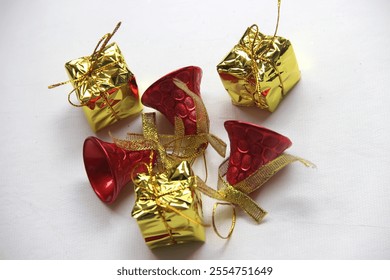 Christmas decoration, red bell, gift box, candy cane, christmas stick, pine cone - Powered by Shutterstock