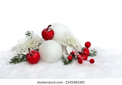 Christmas decoration. Twigs christmas tree, red berries, apple and white balls, white openwork poinsettia flowers on snow with space for text - Powered by Shutterstock