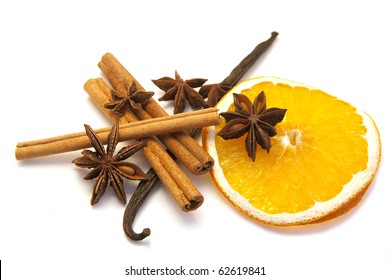 Christmas Decoration: Vanilla Bean, Anise, Cinnamon Sticks And Dried Orange Isolated