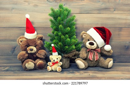 Christmas Decoration With Vintage Toys Teddy Bear Family. Retro Style Toned Picture