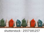 Christmas decoration with wooden small houses in Scandinavian style 