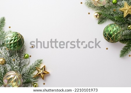 Christmas decorations concept. Top view photo of pine branches in snow with gold green transparent baubles star ornaments and shiny confetti on isolated white background with copyspace