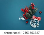 Christmas decorations flat lay on blue background, holiday frame, winter backdrop empty copy space.