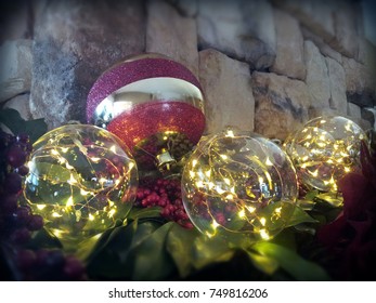 Christmas Decorations And Lights On The Mantle