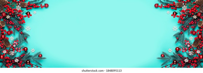 Christmas decorations on the blue background with copy space for your text. Banner.