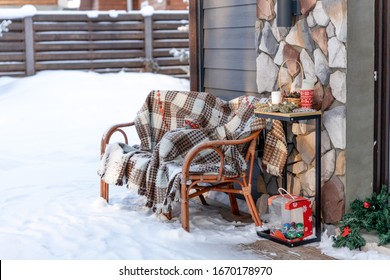 Christmas Decorations On The Porch Of The House