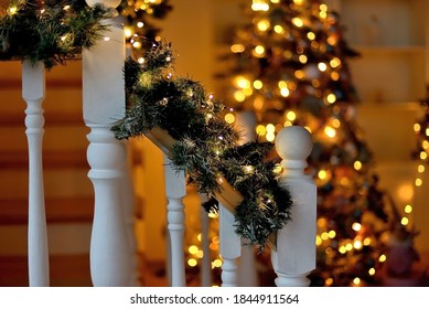 Christmas Decorations With Stairs And Tree Bokeh On Background