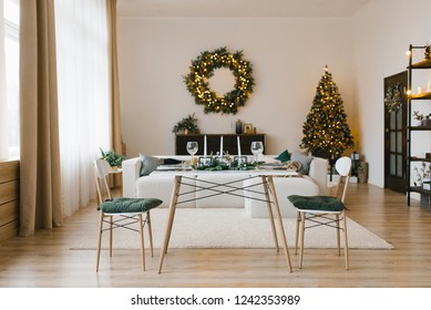 Christmas Dining Table With Two Chairs In The Living Room