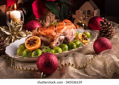 Christmas dinner with brussels sprouts in orange sauce - Shutterstock ID 345536159