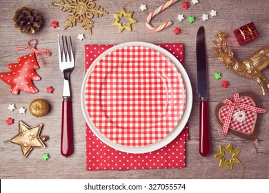 Christmas Dinner Plate Setting With Rustic Decorations. View From Above