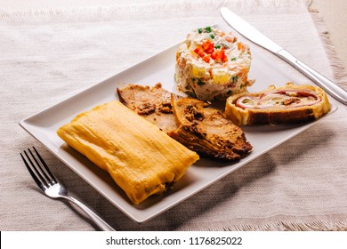 Christmas Dish In Venezuela, Hallaca, Ham Bread, Salad And Pork