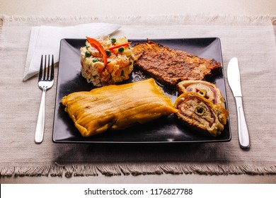 Christmas Dish In Venezuela, Hallaca, Ham Bread, Salad And Pork