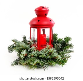 Christmas door wreath made of fir twigs and red lantern with candle inside, isolated on white background.  - Powered by Shutterstock