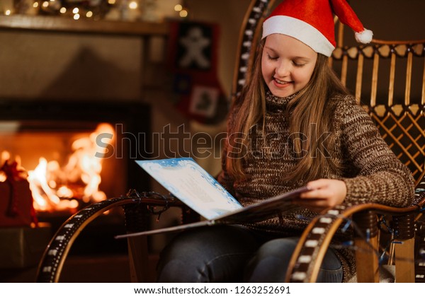 Christmas Eve Little Girl Reading Magic Stock Photo Edit Now