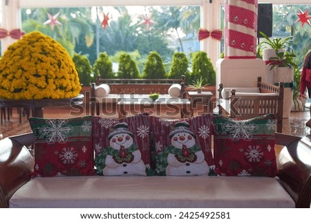 the Christmas event with decorations of tree, tables, boxes, bells, reindeer, with sand, gifts, lighting, packages, with lot of happiness, the decorations in resorts with beautiful things. 