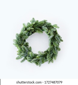 Christmas Evergreen Fir Wreath On Light Gray Background