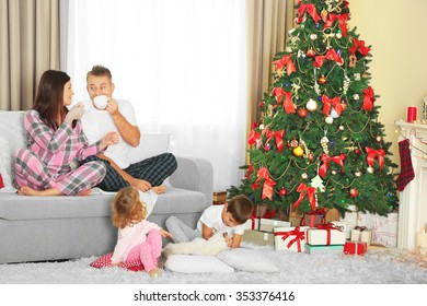 Christmas Family Portrait In Home Holiday Living Room, At Christmas Morning