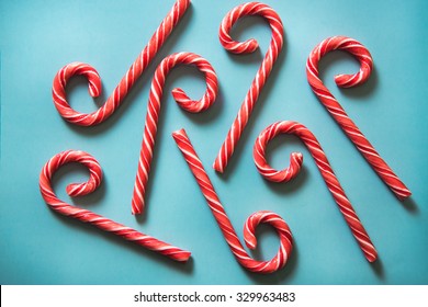 Christmas Festive Candy Canes On Blue Pastel Background