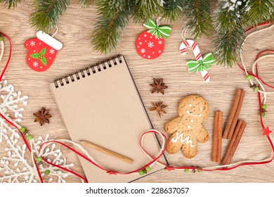 Christmas Fir Tree, Decor, Gingerbrean Man And Blank Notepad For Copy Space