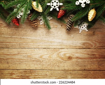 Christmas Fir Tree On Wooden Board Background With Copy Space 