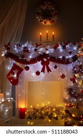 Christmas Fireplace In Night Lights Interior, Xmas Home Room Decorated By Sock Wreath