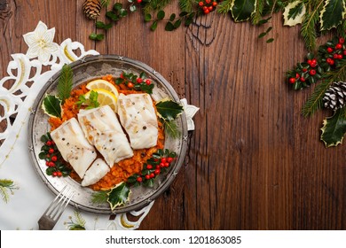 Christmas Fish. Roasted Cod Pieces, Served In Vegetable Sauce. Xmas Styling. Top View.