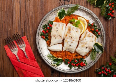 Christmas Fish. Roasted Cod Pieces, Served In Vegetable Sauce. Xmas Styling. Top View.