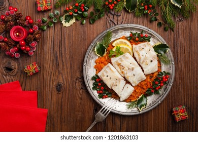 Christmas Fish. Roasted Cod Pieces, Served In Vegetable Sauce. Xmas Styling. Top View.