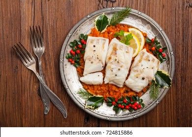 Christmas Fish. Roasted Cod Pieces, Served In Vegetable Sauce. Xmas Styling. Top View.