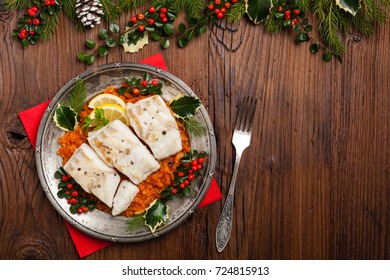 Christmas Fish. Roasted Cod Pieces, Served In Vegetable Sauce. Xmas Styling. Top View.