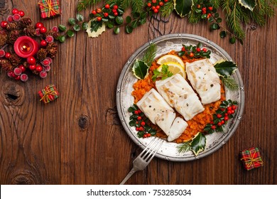 Christmas Fish. Roasted Cod Pieces, Served In Vegetable Sauce. Xmas Styling. Top View.