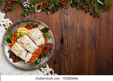 Christmas Fish. Roasted Cod Pieces, Served In Vegetable Sauce. Xmas Styling. Top View.