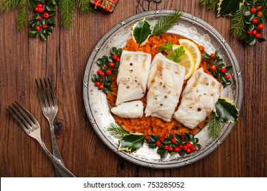 Christmas Fish. Roasted Cod Pieces, Served In Vegetable Sauce. Xmas Styling. Top View.