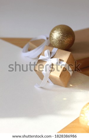 Christmas Flatlay Composition. Gift Box on White Background. Festive Holidays Concept.