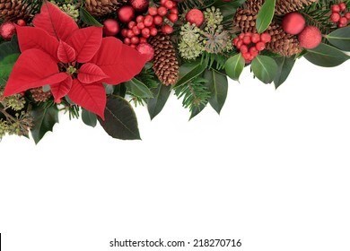 Christmas Floral Background Border With Red Poinsettia Flower, Holly, Baubles And Winter Greenery Over White Background.