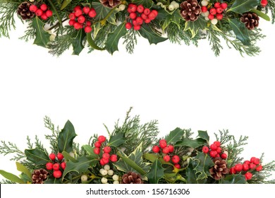 Christmas Floral Border With Holly, Ivy, Mistletoe, Pine Cones And Winter Greenery Over White Background.
