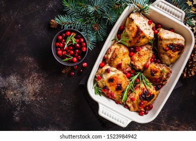 Christmas Food. Chicken Meat Baked With Cranberries And Rosemary In The Oven Dish, Top View.