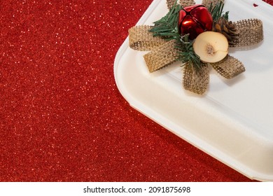 Christmas Food Delivery Container On Red Glitter Background