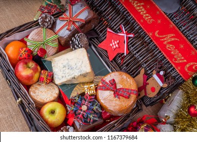 Christmas Food Hamper.
Wicker Hamper Loaded With Christmas Treats And Fruits