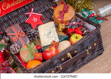 Christmas Food Hamper.
Wicker Hamper Loaded With Christmas Treats And Fruits